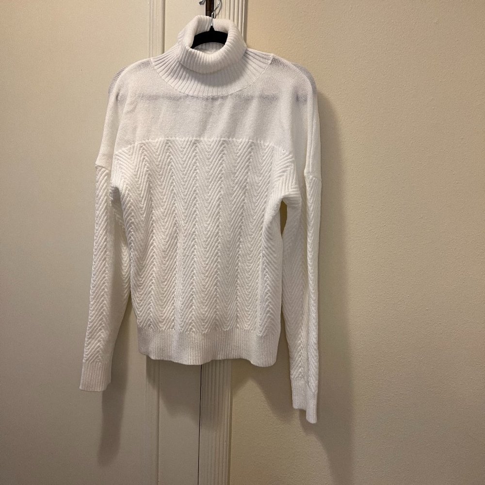 Never worn, cozy turtle neck white sweater